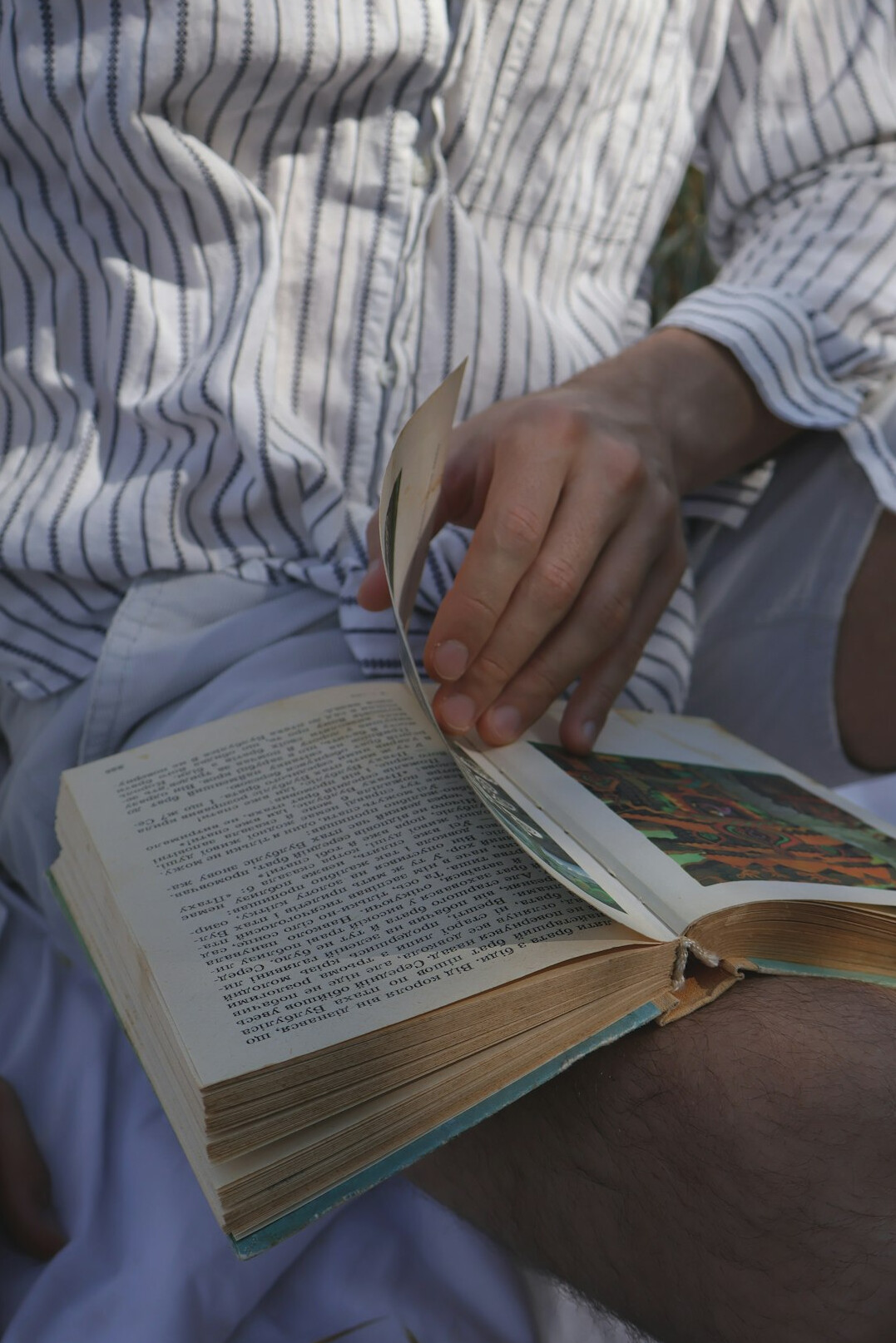 person reading portuguese book