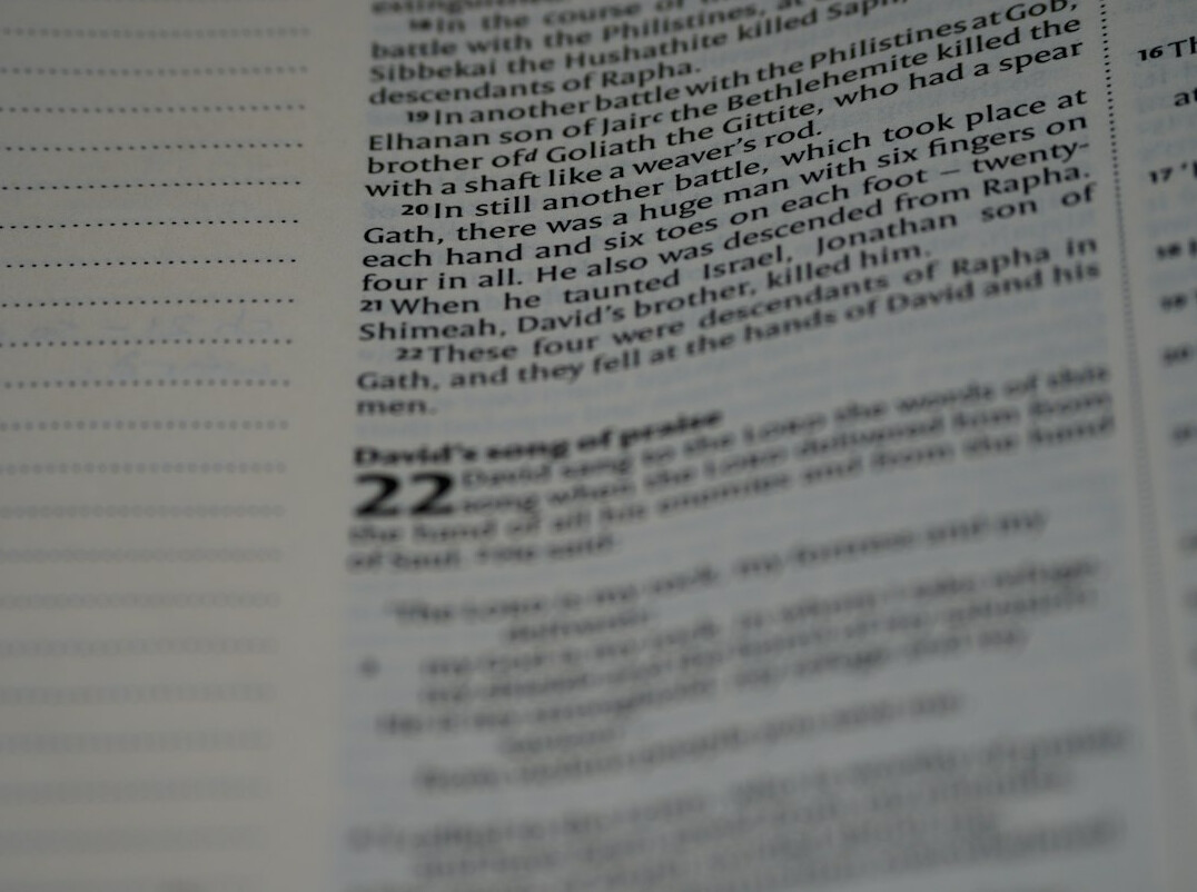 Documents and a pen on a desk being reviewed